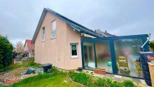 Hausansicht lWohnen mit Sonne im Herzen - Einfamilienhaus mit S�dgarten & Wintergartenidylle in M�hlenbeck