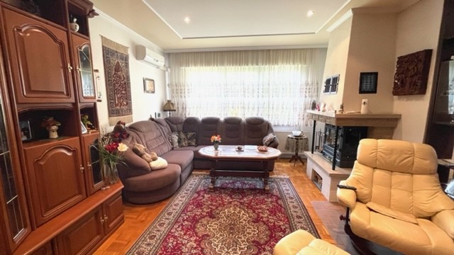 Wohnzimmer mit Kamin Bungalow Berlin