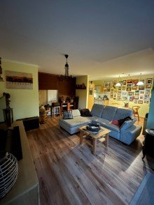 Wohnzimmer mit Blick auf offene K�che Traumwohnung mit Garten am S-Kaulsdorf - Bezugsfrei ab 01.04.2024