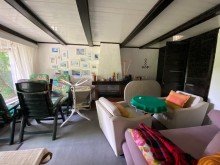 Wohnbereich mit Kamin Baugrundst�ck(Hinten) in A-Lage - Fussl�ufig zum See